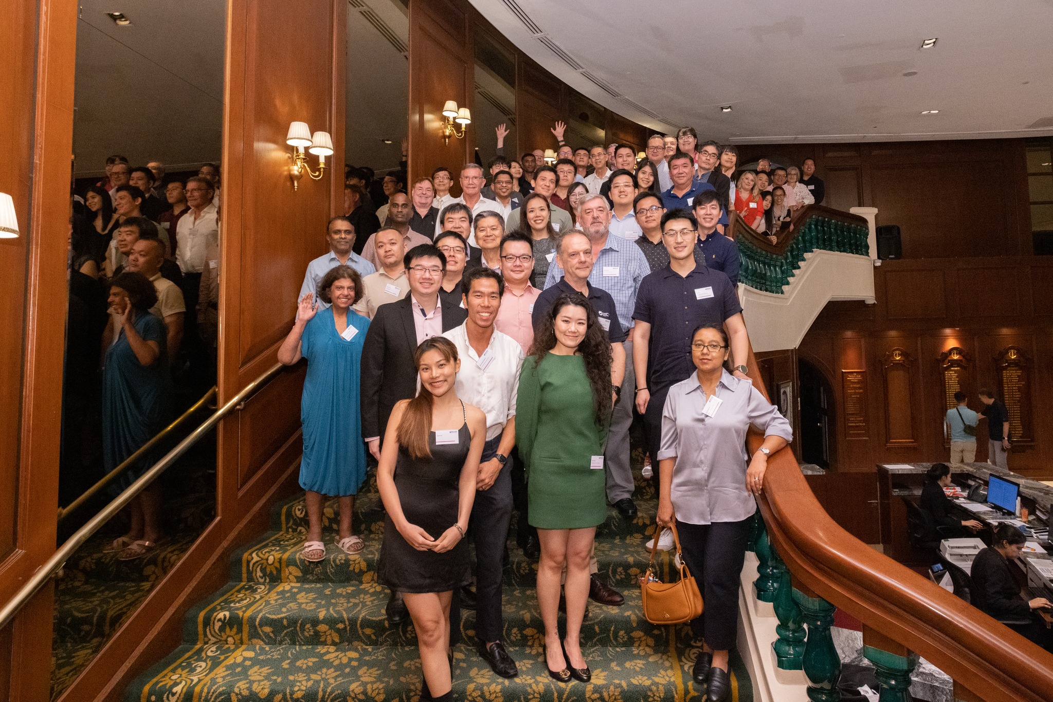 Singapore attendees on stairs