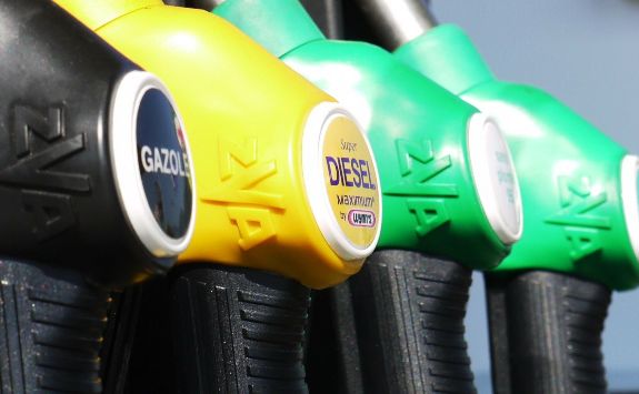 A close up of several petrol pumps.