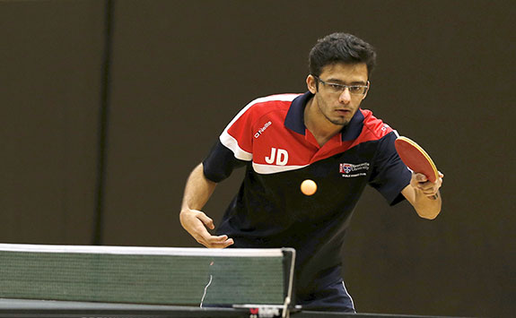 Student playing table tennis